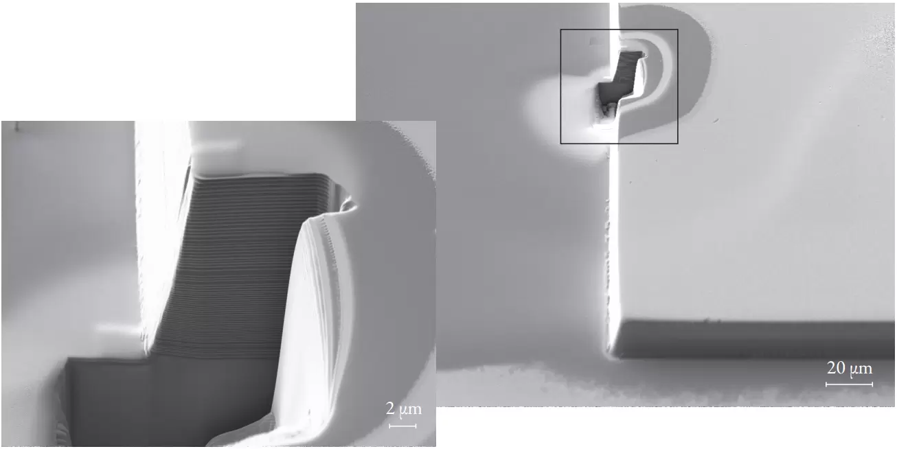 Fig. 3:Using a focused ion beam technique a cross-section at the physical edge of the filter stack was prepared. Note that the edge width is approximately 3µm for an overall filter thickness of 15µm.